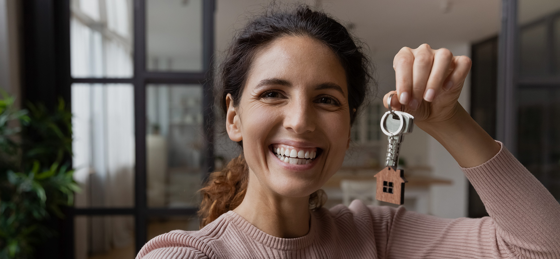 New tenant holding house keys